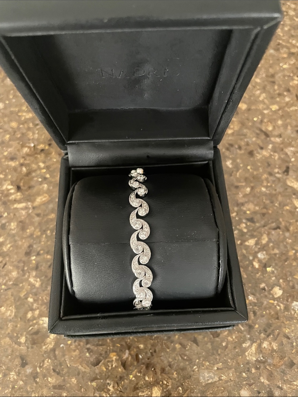 Nadri Silver-Tone Swirl Bracelet with Clear Crystals